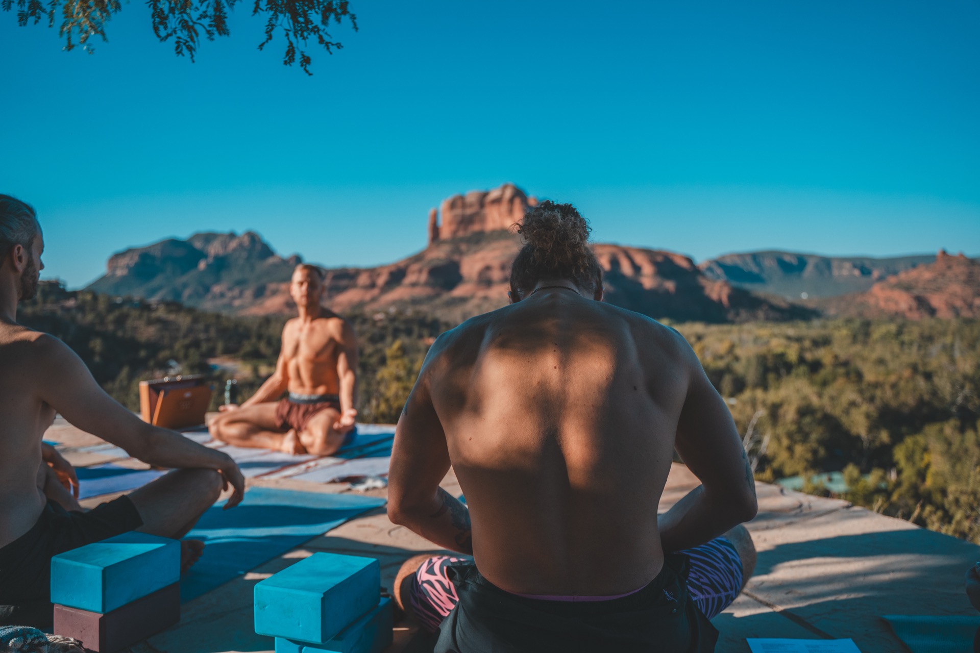 Morning yoga on the open deck above the red rocks, Sedona